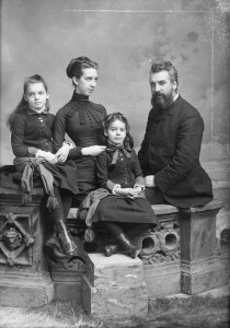 Bell with his wife and daughters